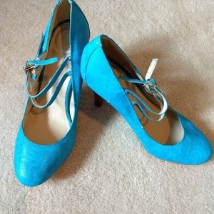 Teal slightly worn heels